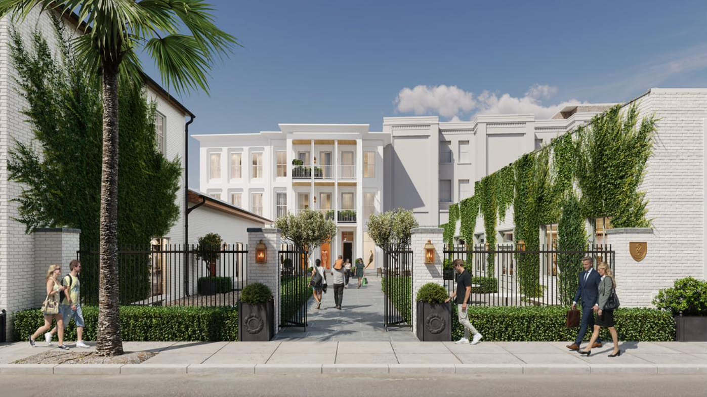 Rendering of the gated courtyard entry on Linguard Street, with brick piers, iron gates, and a stone walk leading to the building.